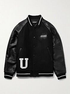 (eBay) Undercover's jacket is modelled off traditional varsity styles. The satin lining ensures smooth layering. Small to size. Appliquéd Wool-Blend Felt And Leather Varsity Jacket. - Fabric 1: 90% wool, 10% nylon; fabric 2: leather (Cow); padding: 100% polyester; trim: 60% acrylic, 40% wool; lining: 100% cupro. Luxury Fall Outerwear With Logo Patch, Luxury Varsity Jacket For Streetwear In Winter, Designer Varsity Jacket For Winter Streetwear, Designer Winter Varsity Jacket For Streetwear, Designer Winter Varsity Jacket For College, Designer Black Outerwear For College, Luxury Varsity Jacket For Fall Streetwear, Luxury Fall Varsity Jacket For Streetwear, Luxury Leather Outerwear For Streetwear