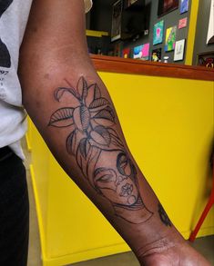 a person with a tattoo on their arm