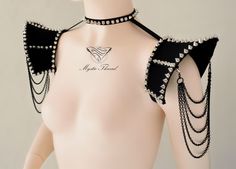 Black choker/suspender shoulder pads decorated with spikes and removable black chains by MysticThreadDesigns on Etsy https://www.etsy.com/listing/519650165/black-chokersuspender-shoulder-pads Edgy Black Spiked Choker, Punk Spikes Choker For Party, Punk Spiked Choker For Parties, Gothic Spiked Choker For Festivals, Edgy Spiked Choker For Party, Alternative Black Choker For Parties, Alternative Style Black Choker For Party, Punk Choker, Shoulder Jewelry