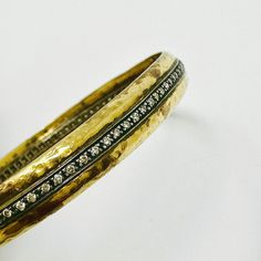 18K Vintage Gold Bangle Bracelet with Diamond (includes appraisal, Value: $6,000) Designer = Jewelry Material = 18K Gold Gemstone = Diamond Condition = Excellent Class = Premier Location: Wilmette Item Number: 11405-1262 Item ID: 283187 Category: Bracelet Luxury Cuff Bracelet With 17 Jewels For Anniversary, Formal Round Cuff Bracelet With Single Cut Diamonds, Formal Cuff Bracelet With Single Cut Diamonds, Designer Diamond Cuff Bracelet Bangle, Designer Diamond Cuff Bangle Bracelet, Designer Bracelets With Single Cut Diamonds For Formal Occasions, Designer Gold Jewelry With Pave Setting, Designer Diamond-accented Bangle For Formal Occasions, Luxury Round Cuff Bracelet For Anniversary