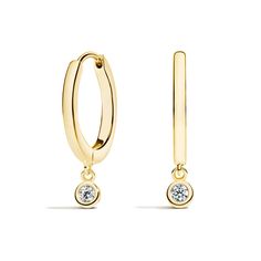 Diamond Drop Huggie Earrings - 14K Yellow Gold. These captivating huggie hoop earrings feature a dainty diamond hanging from lustrous precious metal. Secured with hinged latch backs, these diamond earrings are perfect for everyday wear. Yellow Gold Dangle Huggie Earrings Fine Jewelry, Formal White Gold Huggie Earrings With Single Diamond, Individual Diamond Dangle Huggie Earrings, Fine Jewelry Dangle Huggie Earrings For Formal Events, Dangle Yellow Gold Diamond Hoop Earrings, Classic Round Huggie Earrings With Single Diamond, 14k Gold Dangle Hoop Earrings With Diamond Accents, Formal Fine Jewelry Huggie Dangle Earrings, Classic Small Hoop Diamond Earrings With Single Diamond