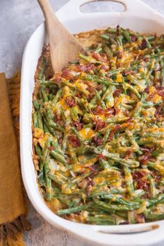 a casserole dish with green beans and bacon