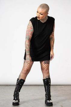 RAPTOR.- Soft, super stretch ribbed fabric.- Statement shoulder lapels.- Sleeveless.- Fitted.- Unisex, so it's for everyone.Model with black hair is 5ft 11 and wears a size L, Model with the tattooed head is 5ft 7 and wears a size L for an oversized look.with KILLSTAR branding, 93% Rayon 7% Elastane. Model With Black Hair, Ribbed Fabric, Black Hair, For Everyone, Sweater Dress, Branding, Hair, Fabric, How To Wear