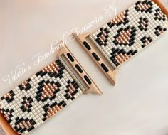 two pieces of beaded bracelet sitting on top of each other