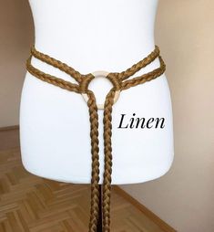 Long Hand Woven Linen belt with Birch Wood Ring. You can wear it in different ways. 100%  Linen / Lithuanian linen yarns Total belt length approx., measured from end to end   250 cm / 98" 300 cm / 118" 370 cm / 145" Wide approx. 1.3 cm / 0.5" All Linen belts https://www.etsy.com/shop/AntiqueArchives?ref=seller-platform-mcnav&section_id=38416618 I ship internationally registered airmail with tracking number from Lithuania Please, feel free to contact us if you have any questions! Bohemian Adjustable Belt For Festivals, Adjustable Bohemian Belt For Festivals, Bohemian Gold Belt For Festival, Gold Bohemian Belt For Festivals, Gold Bohemian Festival Belt, Adjustable Gold Bohemian Belt, Gold Adjustable Bohemian Belt, Gold Bohemian Adjustable Belt, Viking Fashion