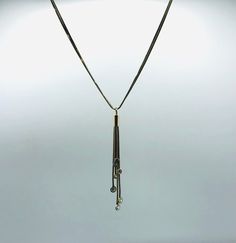 *About me: 925 silver necklace. Veronese tassel necklace with dangling cubic zirconia gem stones. tantalizing tassel neck treasure! *Size: Approx. length 46cm / 18 inches , width 0.4cm / 0.15 inches at widest, tassel length 8.5cm / 3.34 inches *Weight: Approx. 11.8 grams *Hallmark: Italy, 925 *Sponsor: DQCZ, V (Diamonique Cubic Zirconia and Veronese)  *Age: Vintage *Condition: Good vintage condition *Gift boxed to your door ** A vintage item that has been pre-loved, history of wear appropriate t Luxury Dangle Lariat Necklace, Party Necklaces With Tassels And Dangle Shape, Elegant Dangle Tassel Necklace, Party Dangle Necklaces With Tassels, Party Tassel Dangle Necklaces, Elegant Lariat Necklace With Silver Chain And Gold Color, Long Drop Necklace With Diamond Accents For Gift, Long Drop Necklaces With Diamond Accents As Gift, Elegant Drop Necklace With Dangling Beads For Party