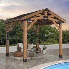 a wooden gazebo sitting next to a swimming pool with chairs and tables around it