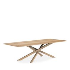 a wooden table with two crossed legs and a rectangular top, on a white background