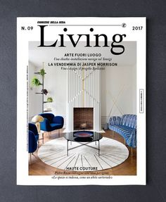 the cover of living magazine with an image of a couch and table in front of it