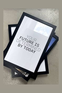 three black and white framed pictures with the words your future is determined by today