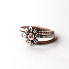 Silver Daisy Stacking Ring Set, Rose Gold Rings, Flower Ring, Boho Flower, Bridesmaid Rings, Antiqued Ring, Stack Bands, Anniversary Gift A NEW LittleGreenRoom set of three rings that are just gorgeous have arrived just in time for the season! You get all three rings pictured in the photos! YAY! A beautiful gift of love for mom, bridesmaids, sisters, and besties too! Great gifts for any and all occasions when a smile on her face is required. ✦This is a CUSTOM ring order✦There is a processing tim Adjustable Flower-shaped Promise Ring, Delicate Adjustable Flower-shaped Ring, Adjustable Flower Midi Rings For Wedding, Rose Gold Sterling Silver Flower Rings, Adjustable Flower Rings For Anniversary, Adjustable Rose Gold Flower Toe Ring, Dainty Adjustable Stackable Flower Ring, Adjustable Rose Gold Flower Ring For Anniversary, Handmade Rose Gold Stackable Rings For Wedding