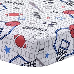 a bed sheet with sports themed designs on it