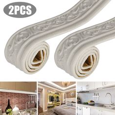 two rolls of white kitchen towels sitting on top of a counter next to a sink