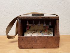 This fabulous shoe shine box was made from old wood vegetable crates. It has a strap and decorative wood dangles! This is from my personal collection and I have enjoyed it for many years. (The letters are not included.)  Condition: AS IS. Expect wear, dirt and slight damage. Letters not included. Thanks for looking!  International buyers, please contact me regarding shipping costs. And please do visit my store home page: https://www.etsy.com/shop/LionandLambVintage Shoe Shine Box, Vegetable Crates, Lion And Lamb, Wood Shoe, Lladro Porcelain, Leather Baby Shoes, Wood Shoes, Shoe Shine, Decorative Wood