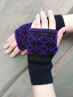 "Beautiful and comfy wrist warmers, handmade by me. These fingerless mitts are hand knitted, using soft black Italian wool and purple color high quality Chzech glass beads. The beads are knitted in, so they will not come out!  They are knitted with love, care and patience. It is gorgeous accessory for spring, autumn and winter or may be used on cold summer eves. Goes perfectly with all kinds of clothing. It is perfect gift for any occasion. Size: 7\"in / 18 cm long Wrist size is 6,3\"-6,7\"in / Handmade Winter Knitting Pattern One Size, Handmade Yarn Knitting Pattern For Winter, Handmade Winter Knitting Pattern In Yarn, Bohemian Handmade Winter Knitting Pattern, Handmade Knitting Pattern Yarn Gift, Winter Gift Crochet Knitting Pattern, Yarn Knitting Pattern For Gifts, Winter Crochet Knitting Pattern For Gift, Winter Crochet Knitting Pattern