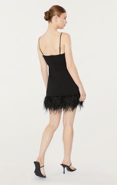 Show off your flattering silhouette in our Cora Dress. Featuring a black fit and flare silhouette with a v-neckline and bow detail, and a mini skirt with a feather hem. Be ready to make a statement in this stunning piece. Fit Details V necklineLinedFit and flare silhouetteMini lengthSleeveless67% Polyester 27% Rayon 6% SpandexDry Clean Only Made in USA Length: 23.5in/59.69cm, from strap seamMeasurements from size 4 Fit Details, Black Fits, Bow Detail, Price Match, Dresses Xs, A Black, Fit And Flare, Mini Skirt, Mini Skirts