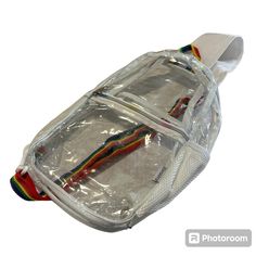 Item: Clear Cross Body Backpack With Adjustable Rainbow Strap Color: White, Rainbow Condition: New Other - New Without Tags But Has Some Discoloration On The Back As Shown Measurements: Approx. 10 Inches Across And 14 Inches Tall All Items Come From A Smoke Free, Pet Friendly Home. White Crossbody Chest Bag For School, Trendy White Chest Bag For School, White Backpack Chest Bag For Travel, White Chest Backpack With Zipper Closure, White Chest Bag Backpack With Zipper Closure, White Nylon Chest Bag With Adjustable Strap, White Chest Bag With Adjustable Strap For School, Functional White Chest Bag Backpack, Casual White Nylon Chest Bag