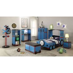 a child's bedroom with blue furniture and decor