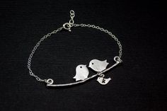 **1 Baby bird-  representation of a happy family adjustable chain bracelet* High quality sterling silver  chain  (All findings are sterling silver  .) Length is adjustable from 6 3/4 to 7 1/4 inches. * Branch charm -16k white gold plating over brass                                 size-1 3/4" / 48mm   Please let me know your choice of 1 letters at the 'note to seller' area during check out.***Add birthstone**https://www.etsy.com/listing/128628999/for-dorocy-jewelry-buyer-only-will-not*Item comes Cute Silver Jewelry With Adjustable Chain, Cute Silver Jewelry For Mother's Day, Personalized Whimsical Silver Jewelry, Whimsical Personalized Silver Jewelry, Whimsical Silver Personalized Jewelry, Cute Silver Bracelet Jewelry, Whimsical Adjustable Personalized Jewelry, Cute Sterling Silver Bracelets For Gift, Cute Sterling Silver Bracelets For Gifts