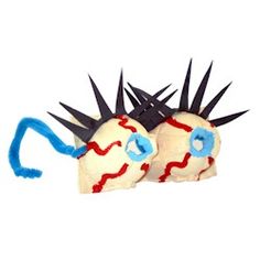 two skulls with spikes on their heads, one is blue and the other is red