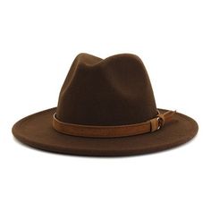 Solid color panama hat featuring single trim. Elegant Brown Felt Hat With Flat Bill, Elegant Brown Flat Bill Hat, Classic Brown Fedora Hat, Trendy Straw Hat With Curved Brim, Classic Fedora For Beach In Fall, Classic Beach Fedora For Fall, Trendy Short Brim Hat, Solid Color Wide Brim Panama Hat For Winter, Elegant Solid Winter Panama Hat With Wide Brim