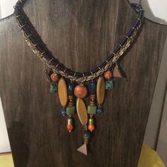 Beautiful Adjustable Wooden Necklace Brown Jewelry With Colorful Beads, Trendy Brown Choker Necklace, Trendy Brown Metal Necklace, Casual Handmade Metal Necklace, Colorful Beaded Bohemian Jewelry, Bohemian Colorful Beaded Jewelry, Bead Necklaces, Wooden Necklace, Ethnic Jewelry