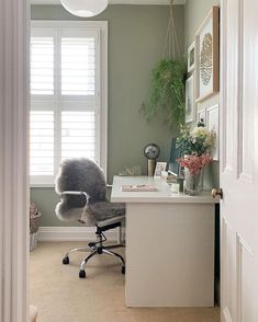 Cosy workspace with fur chair, pistachio green wall Pistachio Bedroom Walls, Home Study Paint Colors, Green Office Wallpaper, Little Greene Normandy Grey, Pistachio Green Wall, Olive Office Walls, Pale Green Office, Normandy Grey Little Greene, Study Room Paint Colors