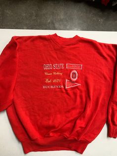 Vintage Ohio State Buckeyes University Classic Crewneck Sweatshirt Varsity Club Red Unique Men's size XL See pics for measurements Quality Embroidered Logo Graphics Fast shipping. We ship same or next day with USPS priority mail We are a small family business and we appreciate your support, Godspeed ! Badgers Logo, Vintage Ohio State, Logo Letters, Club Red, Champion Brand, Vintage Champion, Ohio State Buckeyes, American Classic, Small Family