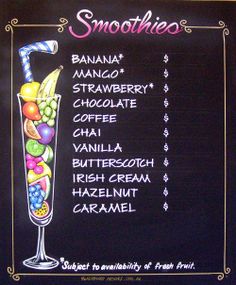 the menu for smoothies is displayed on a blackboard