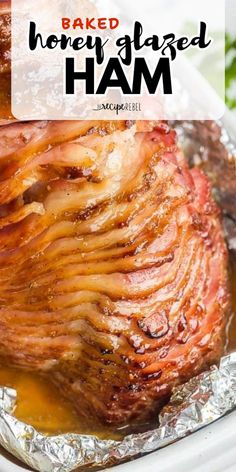 baked honey glazed ham in foil with text overlay