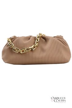 Gorgeous and unique to take your style up a notch...check out our Shaune Pleated Handbag – it's chic, sophisticated, and totally on trend. This ultra-soft vegan leather bag comes with two straps, and it is a 3-in-1...it can me worn as a clutch, under-shoulder, or crossbody. A goldtone bold chainlink, and a crossbody strap that lets you go hands-free. Plus, the pleated design is both eye-catching and elegant, and the handbag itself is spacious enough to hold all your essentials. Whether you're he Elegant Brown Baguette Bag For On-the-go, Trendy On-the-go Clutch Shoulder Bag, Chic Beige Soft Leather Satchel, Trendy Beige Soft Leather Baguette Bag, Chic Hobo Bag With Gold-tone Hardware For On-the-go, Chic Faux Leather Bag With Detachable Strap, Chic Bags With Chain Strap And Double Handle, Trendy Soft Leather Pouch Satchel, Trendy Pouch Baguette Bag With Gold-tone Hardware