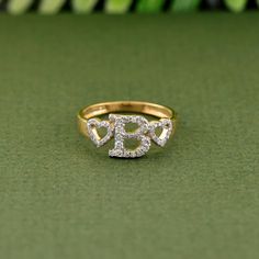 This 0.30 carat round diamond heart ring, crafted in 14K yellow gold, showcases a stunning double heart design with the letter "B" and is available in A-Z initials. Perfect for engagements or as a personalized gift for her, this ring blends timeless elegance with a touch of individuality, making it a thoughtful and beautiful piece to treasure. - Diamond Detail:- ↦ Diamond Shape: Round ↦ Diamond Weight: 0.30 CTW (approx) ↦ Diamond Clarity: VS ↦ Diamond Color: GH ↦ Diamond Cut: Excellent - Metal D Heart Ring Engagement, Treasure Diamond, B Heart, Double Heart Ring, Heart Engagement Rings, Diamond Heart Ring, Letter Ring, Vs Diamond, Double Heart