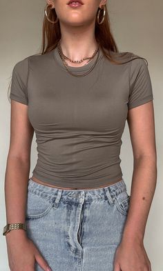 The best fit for a baby tee - a super soft material that forms to your body! A piece that you'll want to wear 24/7. Why not grab both? Comes in black and warm grey. Model is 5'9 with a 35" bust, 28" waist, 38" hips, and wearing a small. Model typically wears a size 6. This item runs true to size. Tiny Tank, Platform Heels Boots, Sandal Platform, Custom Sweatshirts, Going Out Tops, Warm Grey, Custom Tees, Going Out Dresses, Sneaker Heels