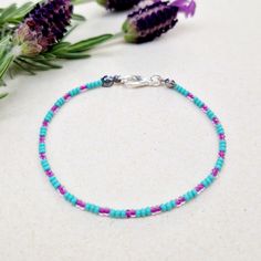 This beaded bracelet is handmade with 2 mm high quality seed beads and metal guards on each end of the bracelet to protect it from breaking. Bracelet is measured from end to end. Please measure your wrist and add about 1/2 inch to measured length. The best option i to measure bracelet you already use.  Bracelet is fine and delicate, perfect for stacking but also cute on its own. I hope you will love wearing it as much as I loved making it. Every piece of my jewelry comes gift wrapped. Be aware that colour may vary depending on minitor and lightning conditions. Please avoid contact with water, perfume and other cosmetics. Do not excercise, sleep or shower when wearing your bracelet. Dainty Blue Friendship Bracelets With Colorful Beads, Dainty Blue Friendship Bracelets With Tiny Beads, Dainty Blue Friendship Bracelet With Tiny Beads, Blue Dainty Beaded Bracelets For Friendship, Dainty Blue Beaded Bracelets For Friendship, Minimalist Pink Beaded Bracelets With Tiny Beads, Minimalist Pink Beaded Bracelet With Tiny Beads, Minimalist Blue Friendship Bracelets With Colorful Beads, Minimalist Pink Tiny Beaded Bracelets