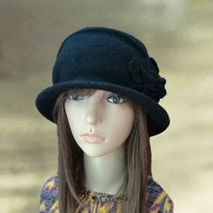 This elegant and stylish woman's felt cloche hat is soft and warm. This hat is very comfortable and easy to wear. It is a very stylish women's hat that is going to keep you warm in cold days, yet you will look amazing. You can put it on with classic and casual style clothing, so this beautiful hat is very universal. Composition: 100% wool One size fits an average woman's head. CARE: Hand wash in lukewarm water. Do not dry in the dryer! Air dry over a balloon or small bowl to retain hat shape and Ladies Winter Hats, Womens Winter Hats, White Fedora Hat, Stylish Womens Hats, Felted Hats, Wool Cloche Hat, Cloche Hats, Wool Hats, Hats Black