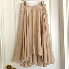 Mable Hi Low Flowy Pull-On Skirt With Pockets. Neutral/Sand Labeled As Size M But Fits Like S. See Waist Measurement. Nwt. Goes With Sneakers, Sandals, Heels, Or With Boots In The Fall. 3 Season Wear. Beige Asymmetrical Maxi Skirt For Spring, Beige Asymmetrical Skirt For Spring, Summer Beige Pleated Maxi Skirt, Beige Flared Skirt For Summer, Beige Pleated Maxi Skirt For Summer, Cream Flared Skirt For Summer, Cream Asymmetrical Summer Skirt, Cream Asymmetrical Relaxed Skirt, Beige Summer Maxi Skirt For Day Out