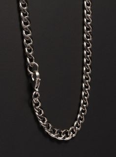 For the minimalist man, a sleek and modern stainless steel curb chain necklace without a pendant. Part of of our WATERPROOF COLLECTION: https://etsy.me/3xCErtp Stainless Steel Curb Chain Necklace for Men Chain Width: 7mm Clasp: Lobster. Material: Stainless steel Note: model is wearing 20 inch chain. You can check our more customizable pieces in our shop and don't forget to connect with us :) weareallsmith.etsy.com or on Instagram: http://instagram.com/weareallsmith (@weareallsmith) Message us if Silver Stainless Steel Cuban Link Necklace For Everyday, Everyday Silver Cuban Link Necklace In Stainless Steel, Minimalist Stainless Steel Cuban Link Chain Necklace, Minimalist Stainless Steel Curb Chain Necklace, Silver Cuban Link Necklace In Stainless Steel, Modern Stainless Steel Curb Chain Necklace, Silver Stainless Steel Cuban Link Necklace, Modern Silver Cuban Link Necklace As Gift, Modern Silver Cuban Link Necklace Gift