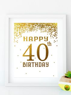 a white and gold birthday card with the number 55 on it, next to a pineapple