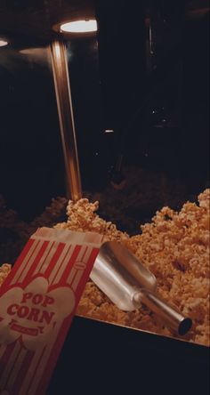 a box of popcorn sitting on top of a table