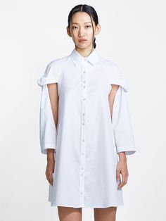 white cotton topsy turvy shirtdress with exposed arms Elegant Shirt Dress With Button Cuffs And Shirttail Hem, Spring Shirt Dress With Button Cuffs And Shirttail Hem, Elegant Asymmetrical Shirt Dress For Summer, Elegant Asymmetrical Summer Shirt Dress, Spring Shirt Dress With Button Cuffs For Dress Down, Spring Shirt Dress With Cuffed Sleeves And Button-up, Spring Button-up Shirt Dress With Cuffed Sleeves, Chic Asymmetrical Shirt Dress For Summer, Elegant Asymmetrical Shirt Dress For Spring