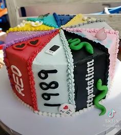 there is a cake decorated with coca colas