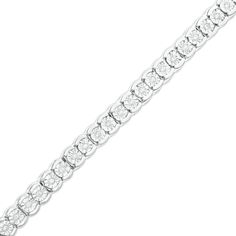 Wrap your wrist in a classic and shimmering style with this diamond tennis bracelet in sterling silver. Crafted in sterling silver Each diamond in this continuous line is artfully set to enhance size and sparkle. Radiant with 1/4 ct. t.w. of diamonds This 7.25-inch bracelet secures with a box clasp. Elegant Silver Tennis Bracelet With Channel Set, Classic Silver Channel Set Diamond Bracelet, Elegant Silver Channel Set Tennis Bracelet, Elegant Silver Tennis Bracelet Channel Set, Classic White Sterling Silver Bracelet With Diamond Accents, Classic Silver Tennis Bracelet With Channel Set, White Gold Channel Set Tennis Bracelet For Anniversary, Elegant White Gold Tennis Bracelet With Channel Set, Elegant White Gold Tennis Bracelet Channel Set