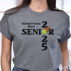 Customized Tennis Senior 2025 T-shirts is the perfect gift for your Class of 2025 Senior!  Customize with your senior's school name! In the personalization box, enter the school name. (Ex: Western Hills High School) This is made with the Bella & Canvas 3001 classic unisex jersey short sleeve tee.  It fits like a well-loved favorite, soft cotton and quality print make users fall in love with it over and over again. These t-shirts have-ribbed knit collars to bolster shaping. The shoulders have tap Sporty School T-shirt With Name Print, School Spirit T-shirt With Team Name For School Events, Customizable Crew Neck T-shirt For School Events, Customizable School Spirit T-shirt For College Events, Sporty T-shirt With Name Print For School, Tennis Shirt, Tennis Team, Class Of 2025, Tennis Shirts