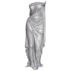 a statue of a woman wearing a draped dress