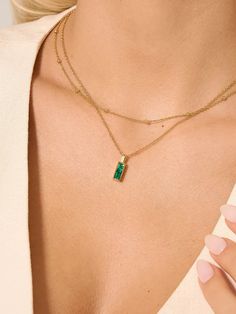 Discover the charm of OBY's Emerald Bar Necklace. Perfect for any occasion, it embodies elegance and style in every detail. Shop now! Luxury Rectangular Emerald Gemstone Necklace, Elegant Rectangular Gemstone Pendant Jewelry, Elegant Rectangular Pendant Gemstone Jewelry, Luxury Delicate Chain Necklaces For Layering, Formal Necklace With Rectangular Pendant And Adjustable Chain, Formal Necklace With Adjustable Chain And Rectangular Pendant, Elegant Chain Necklace With Rectangular Pendant For Formal Occasions, Elegant Formal Chain Necklace With Rectangular Pendant, Elegant Yellow Gold Emerald Necklace With Adjustable Chain