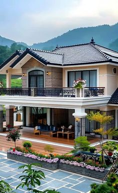 the house is surrounded by mountains and greenery