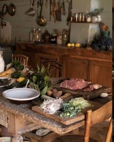 a table with food on it in a kitchen