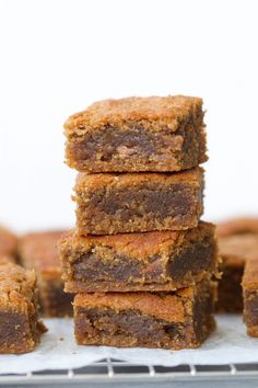 a stack of brownies sitting next to each other