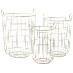 two white wire baskets sitting next to each other