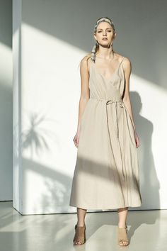 Wrap linen dress. This beige dress perfect for effortless summer styles that you can wear on vacation and when back in the city, too. Hand-crafted from lightweight airy linen the dress will be amazing choice for hot summer days. This beige slip dress has a flattering wrap silhouette. The midi wrap dress will be perfect as beach dress as well as guest dress in summer boho weddings. boho slip dress / camel summer dress / beige sundress / stylish dress #ecofahion #dress Summer Maxi Wrap Sundress, Beige V-neck Wrap Dress For Summer, Chic Summer Maxi Dress With Wrap-around Straps, Elegant Summer Maxi Dress With Wrap-around Straps, Linen A-line Maxi Dress For Brunch, A-line Linen Maxi Dress For Brunch, Linen Sundress Maxi Dress For Brunch, Beige Wrap Dress For Summer, Summer Beige Wrap Dress